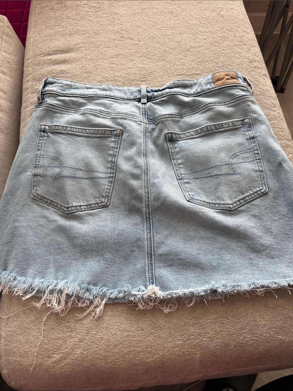 American Eagle Outfitters Light Blue Denim Mini Skirt with Frayed Hem